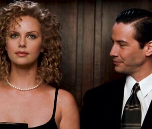 Charlize Theron, Connie Nielsen - THE DEVIL'S ADVOCATE