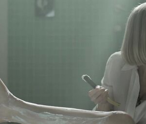 Shaving legs and a nude scene in the bathroom with topless celebrity Sara Malakul of the movie "Sun Choke"