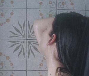 Topless Melanie Laurent from Shower Video of the French movie "La chambre des morts"