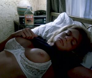 Topless Hollywood Scene | Erika Eleniak - CHASERS (1994)